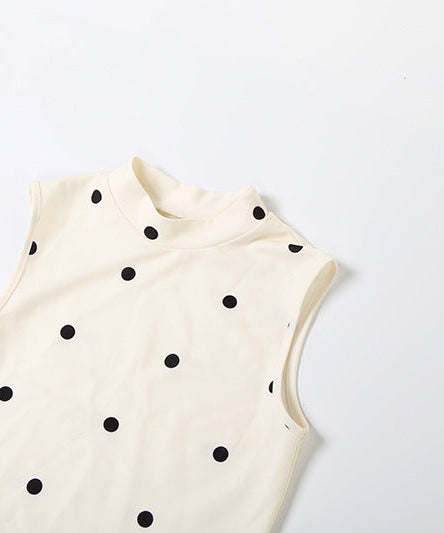 Holiday Glam: Chic Polka Dot Mock Neck Mini Dress with Statement Bow