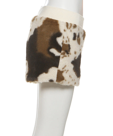 Untamed Chic: Faux Fur Cow Print Medium Rise Shorts – Your Cozy Fall & Holiday Statement Piece