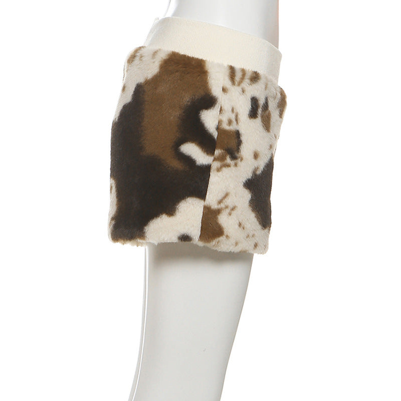 Untamed Chic: Faux Fur Cow Print Medium Rise Shorts – Your Cozy Fall & Holiday Statement Piece