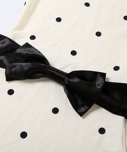 Holiday Glam: Chic Polka Dot Mock Neck Mini Dress with Statement Bow