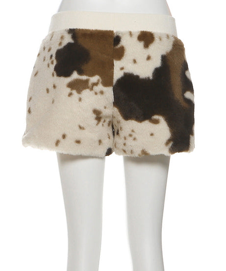 Untamed Chic: Faux Fur Cow Print Medium Rise Shorts – Your Cozy Fall & Holiday Statement Piece