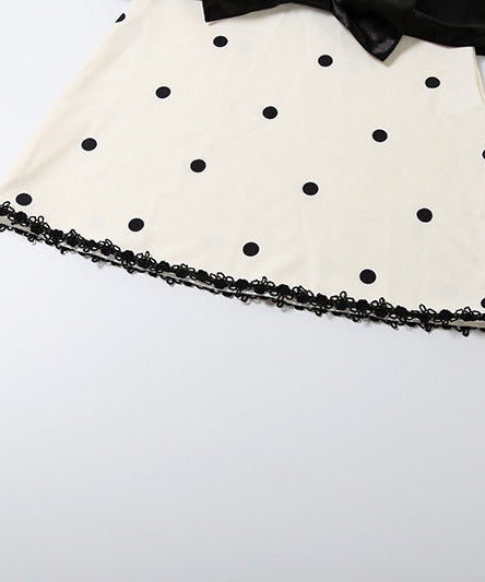 Holiday Glam: Chic Polka Dot Mock Neck Mini Dress with Statement Bow