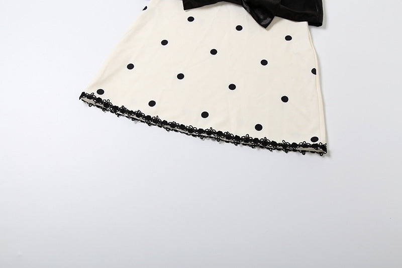 Holiday Glam: Chic Polka Dot Mock Neck Mini Dress with Statement Bow