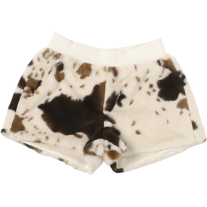 Untamed Chic: Faux Fur Cow Print Medium Rise Shorts – Your Cozy Fall & Holiday Statement Piece