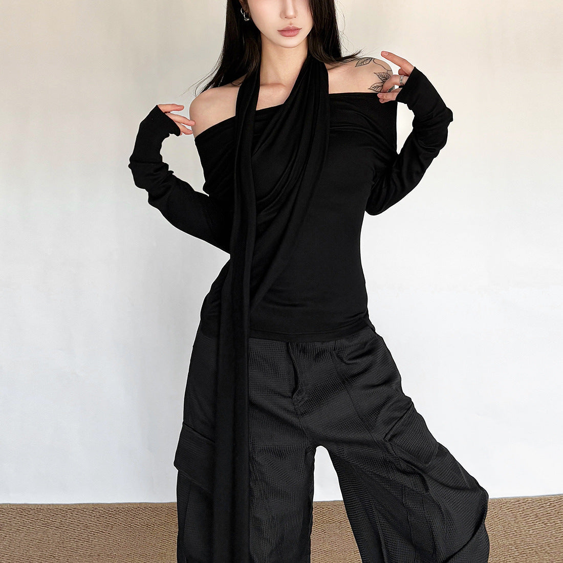 Fall '25 Chic: Black Draped Off-Shoulder Long Sleeve Top | Modern Allure