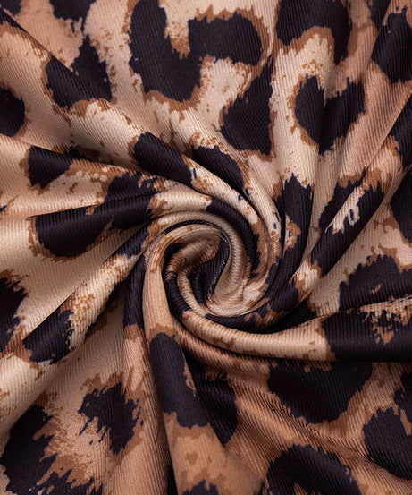 Fierce & Chic: Long Sleeve Leopard Print Maxi Dress with Daring Cutout - Your Fall & Holiday Statement Piece