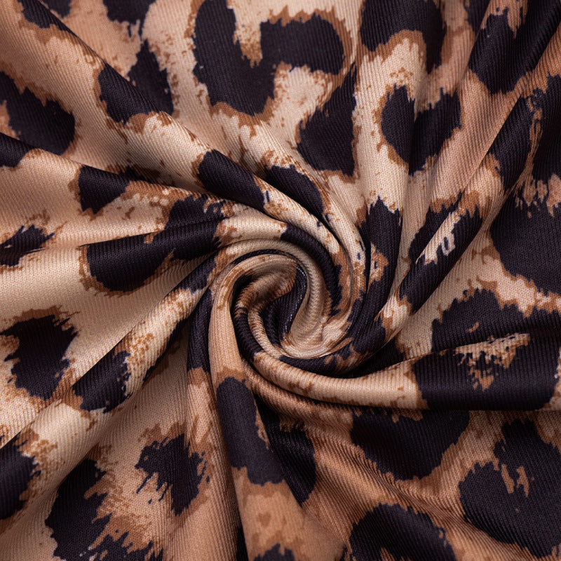 Fierce & Chic: Long Sleeve Leopard Print Maxi Dress with Daring Cutout - Your Fall & Holiday Statement Piece