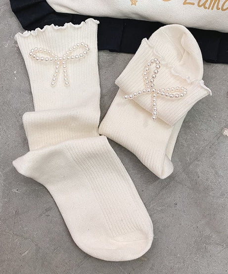 Autumn Chic: Faux Pearl Bowknot Ribbed Ruffle Knee-High Socks for Women