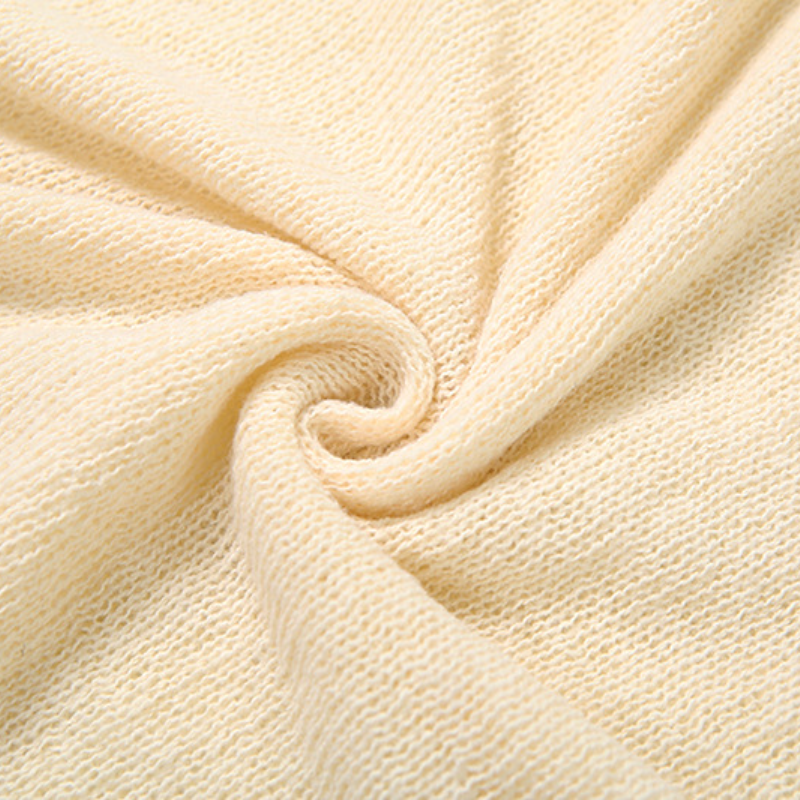 Autumn Resort Chic: V-Neck Knit Cut-Out Maxi Dress – Your Effortless Fall Getaway & Statement Piece