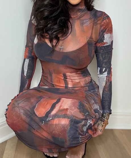 The 'It' Piece: Abstract Mesh Ruched Jumpsuit - Fall's Must-Have Statement