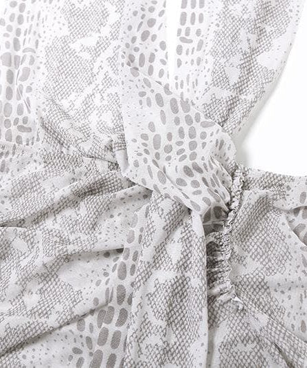 Unleash Your Fierce: Snakeskin Halter Ruched Mini Dress – Perfect for Halloween & Fall Nights Out