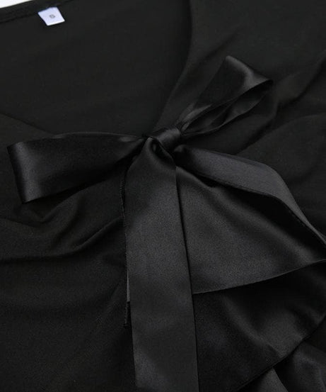 Elevated Fall Chic: Black V-Neck Long Sleeve Top with Satin Ruffle Detail