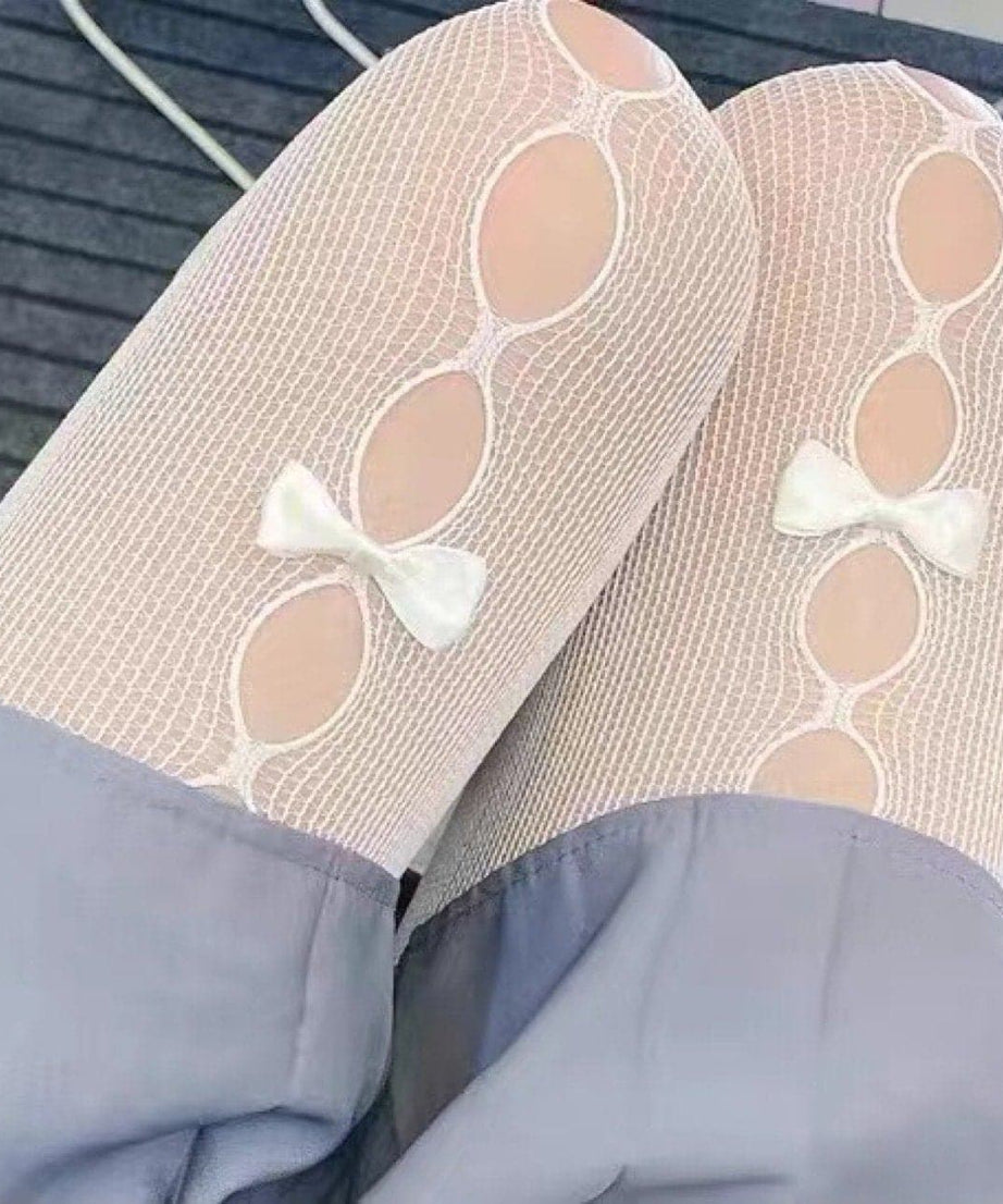Enchanting White Fishnet Tights with Bow & Cut-Outs – Your Fall & Halloween Style Secret!