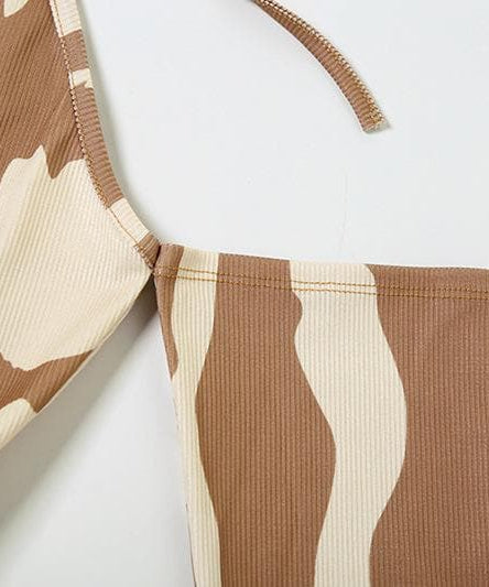 Edgy Fall Nights: Abstract Print Halter Cut-Out Mini Dress with Cold Shoulder Sleeves