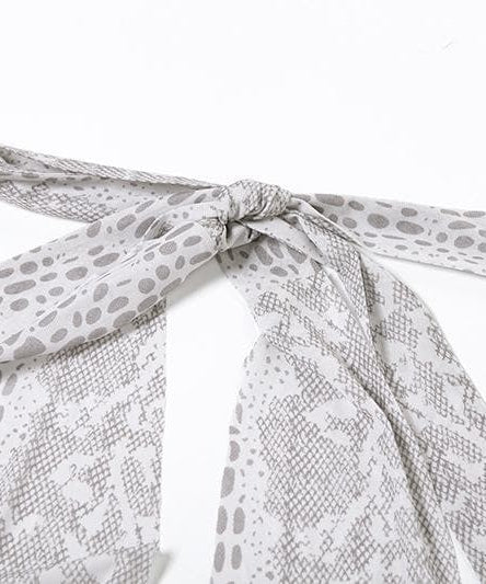 Unleash Your Fierce: Snakeskin Halter Ruched Mini Dress – Perfect for Halloween & Fall Nights Out