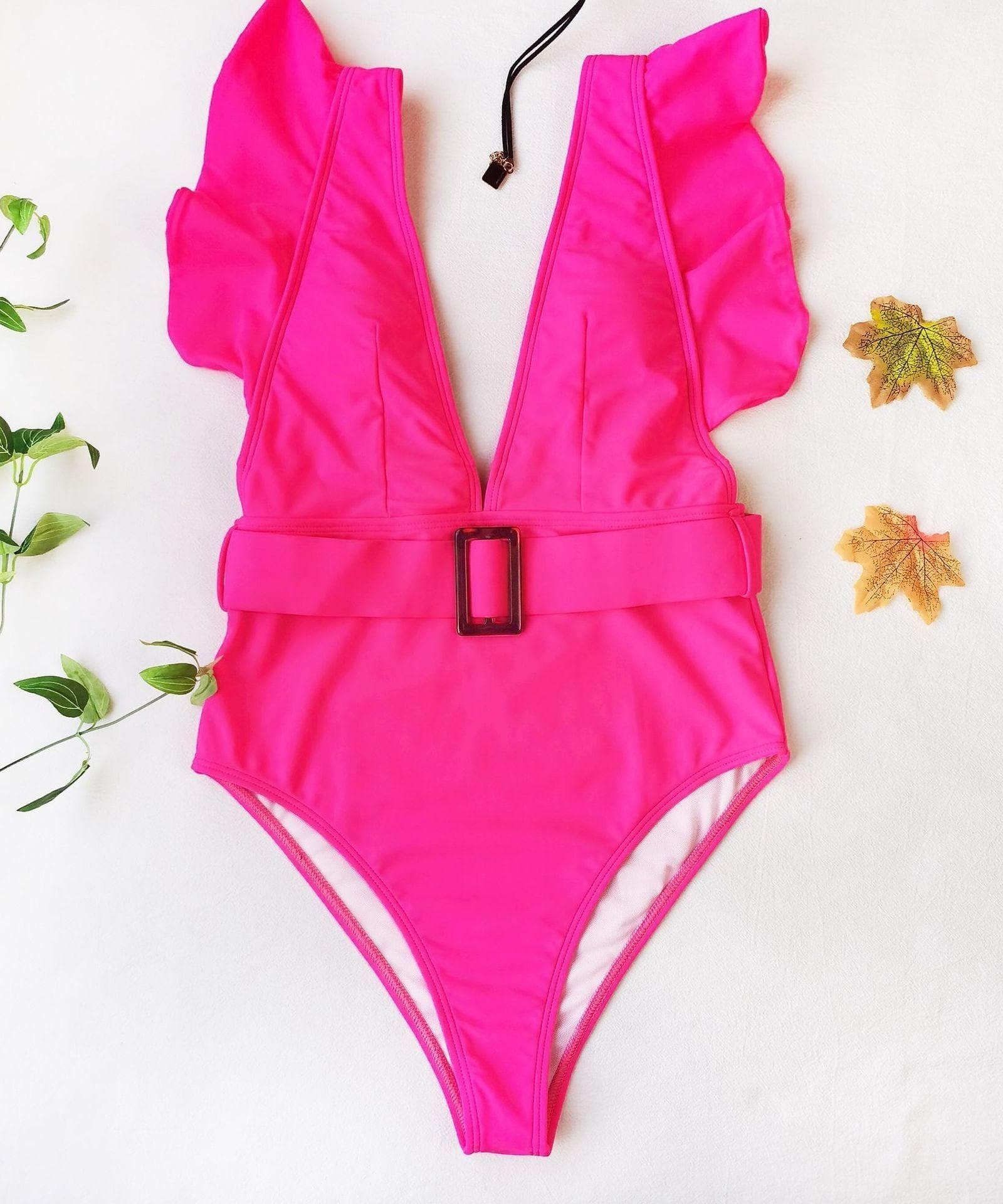 Chic White Ruffle V-Neck One-Piece Swimsuit with Tortoiseshell Buckle | Your Resort & Winter Vacation Essential