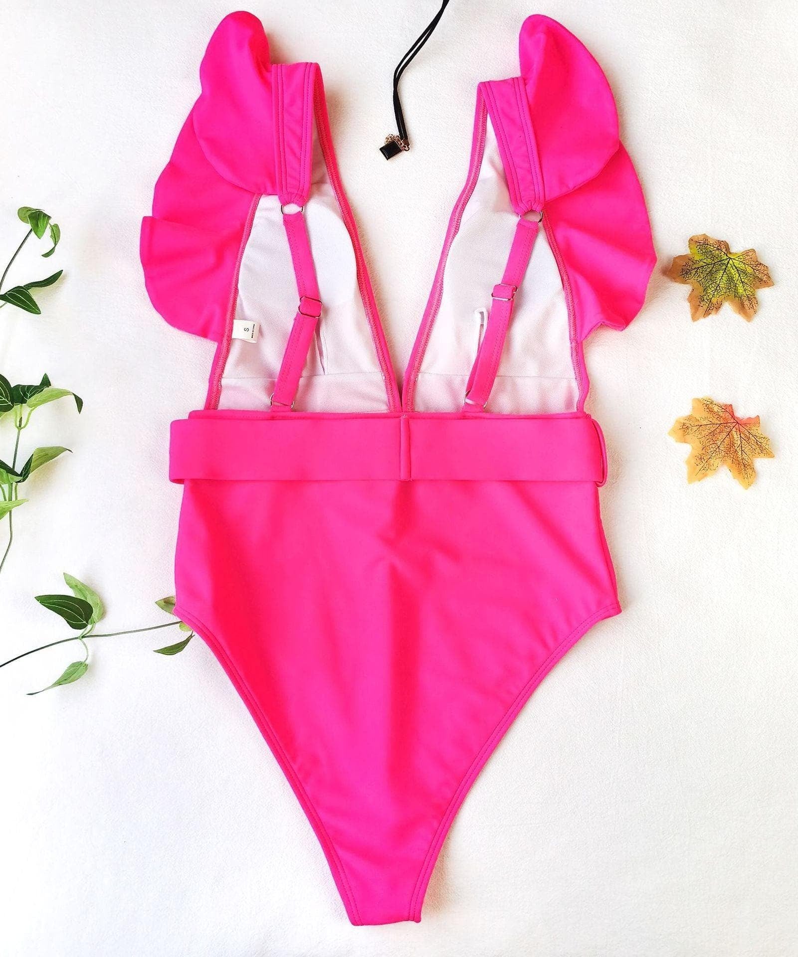 Chic White Ruffle V-Neck One-Piece Swimsuit with Tortoiseshell Buckle | Your Resort & Winter Vacation Essential