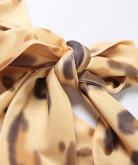 Allure & Edge: Leopard Print Halter Maxi Dress with Backless Design & Asymmetrical Lacing - Your Fall & Holiday Statement Piece