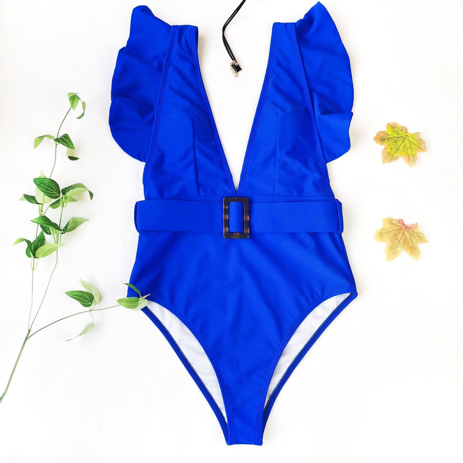 Chic White Ruffle V-Neck One-Piece Swimsuit with Tortoiseshell Buckle | Your Resort & Winter Vacation Essential