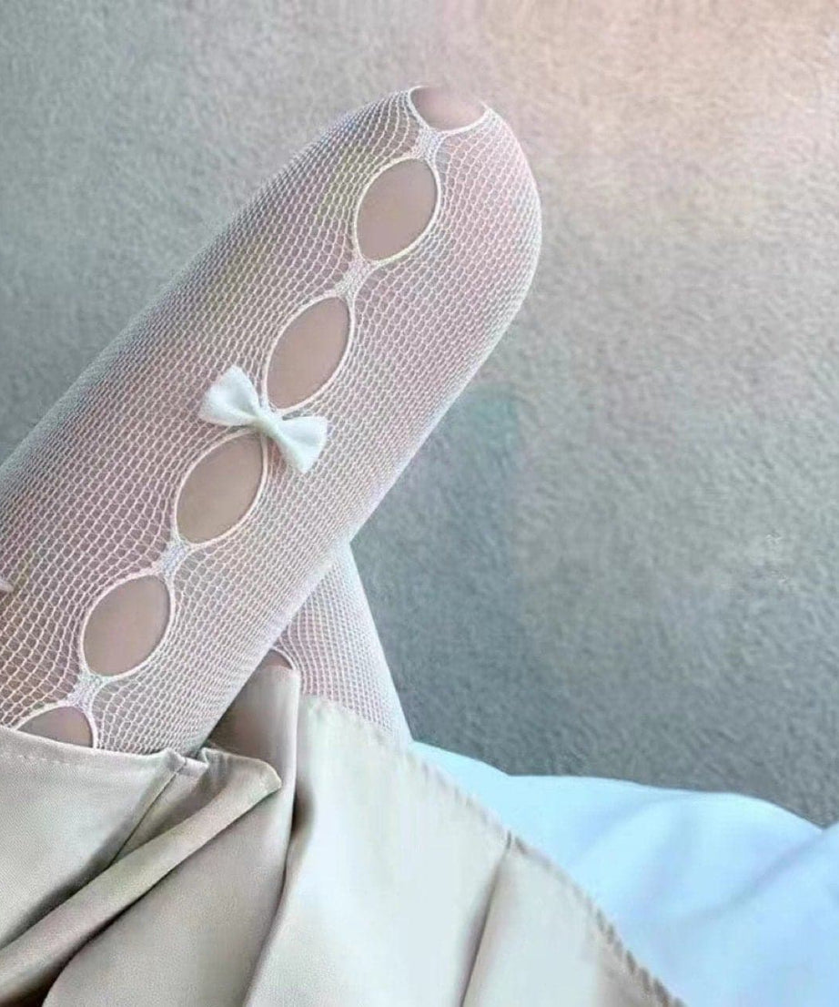 Enchanting White Fishnet Tights with Bow & Cut-Outs – Your Fall & Halloween Style Secret!