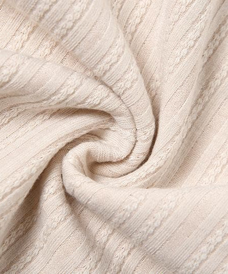 Elevated Fall Ribbed Knit Long Sleeve Top | Chic Chain & Buckle Detail, Asymmetrical Hem