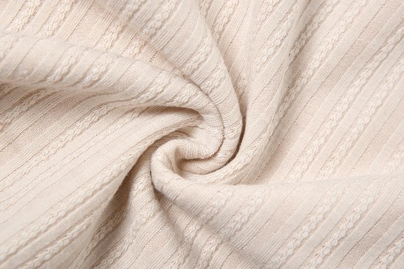 Elevated Fall Ribbed Knit Long Sleeve Top | Chic Chain & Buckle Detail, Asymmetrical Hem