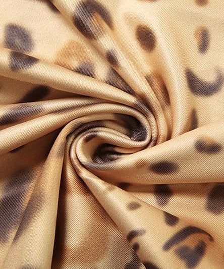 Allure & Edge: Leopard Print Halter Maxi Dress with Backless Design & Asymmetrical Lacing - Your Fall & Holiday Statement Piece