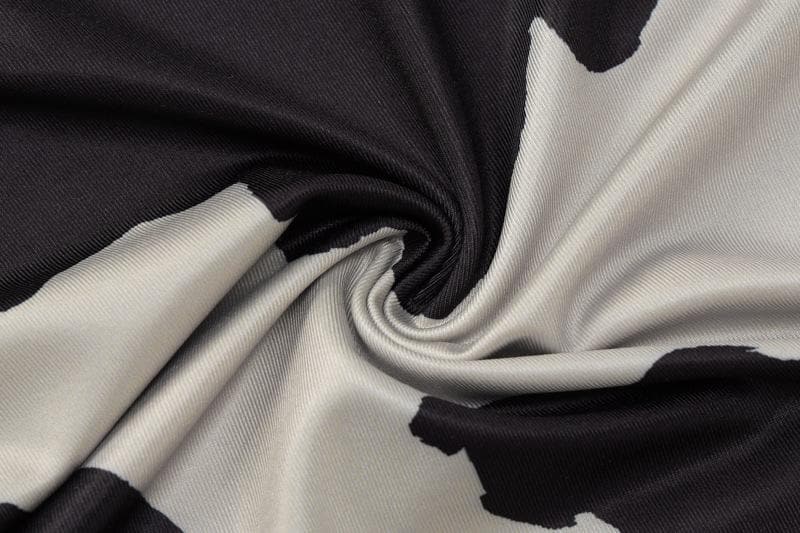 Fall Trend Alert: Cow Print Mock Neck Long Sleeve Bodycon Midi Dress with Asymmetrical Hem