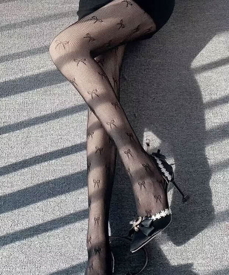 Bowknot pattern fishnet tights