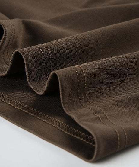 Spooky Season Chic: Y2K Low-Rise Ruched Shorts with Dazzling Beaded Tassels – Perfect for Fall Parties & Halloween