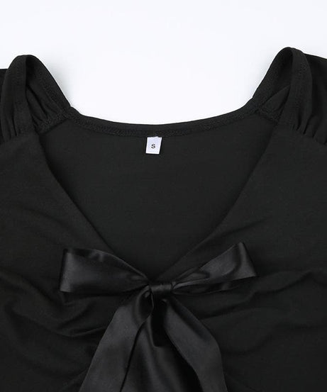 Elevated Fall Chic: Black V-Neck Long Sleeve Top with Satin Ruffle Detail