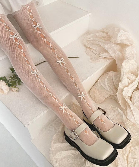 Chic Pearl Bow Fishnet Tights – Your Must-Have for Fall & Halloween Style