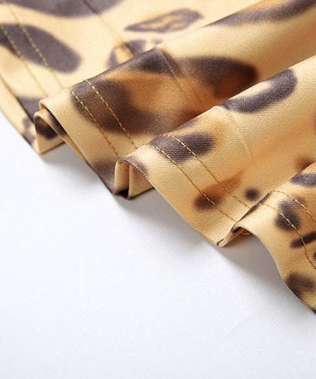 Allure & Edge: Leopard Print Halter Maxi Dress with Backless Design & Asymmetrical Lacing - Your Fall & Holiday Statement Piece