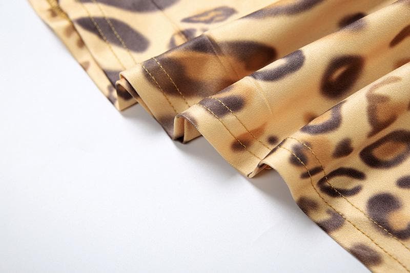 Allure & Edge: Leopard Print Halter Maxi Dress with Backless Design & Asymmetrical Lacing - Your Fall & Holiday Statement Piece