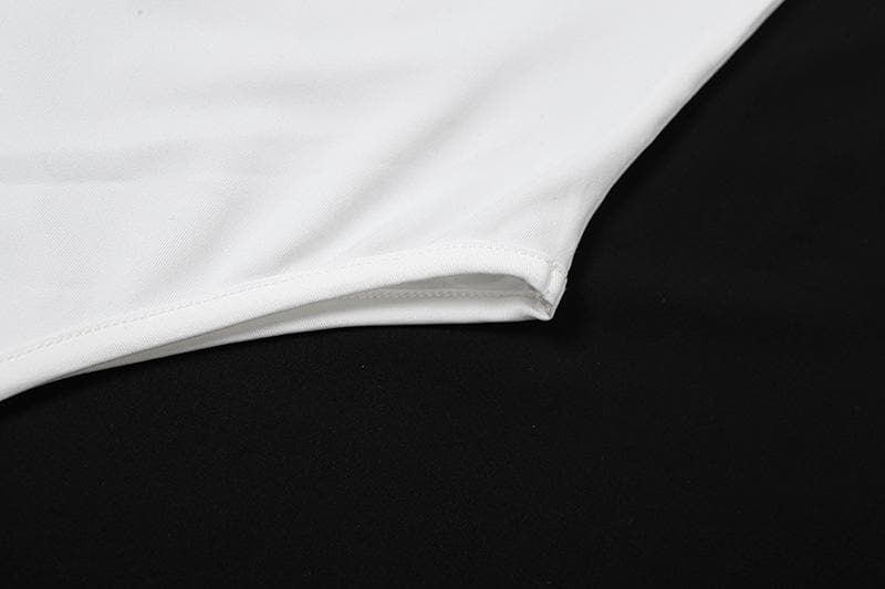 Make a Splash This Fall: The Iconic 'WET' Statement Bodysuit for Edgy Style