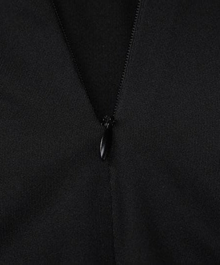 Daring Black Cutout Jumpsuit with Built-In Gloves - Sleek Halloween & Holiday Statement Catsuit