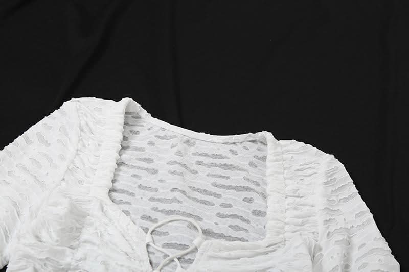 Y2K Chic White Textured Lace-Up Crop Top | Ruched Long Sleeve Fall Fashion Statement