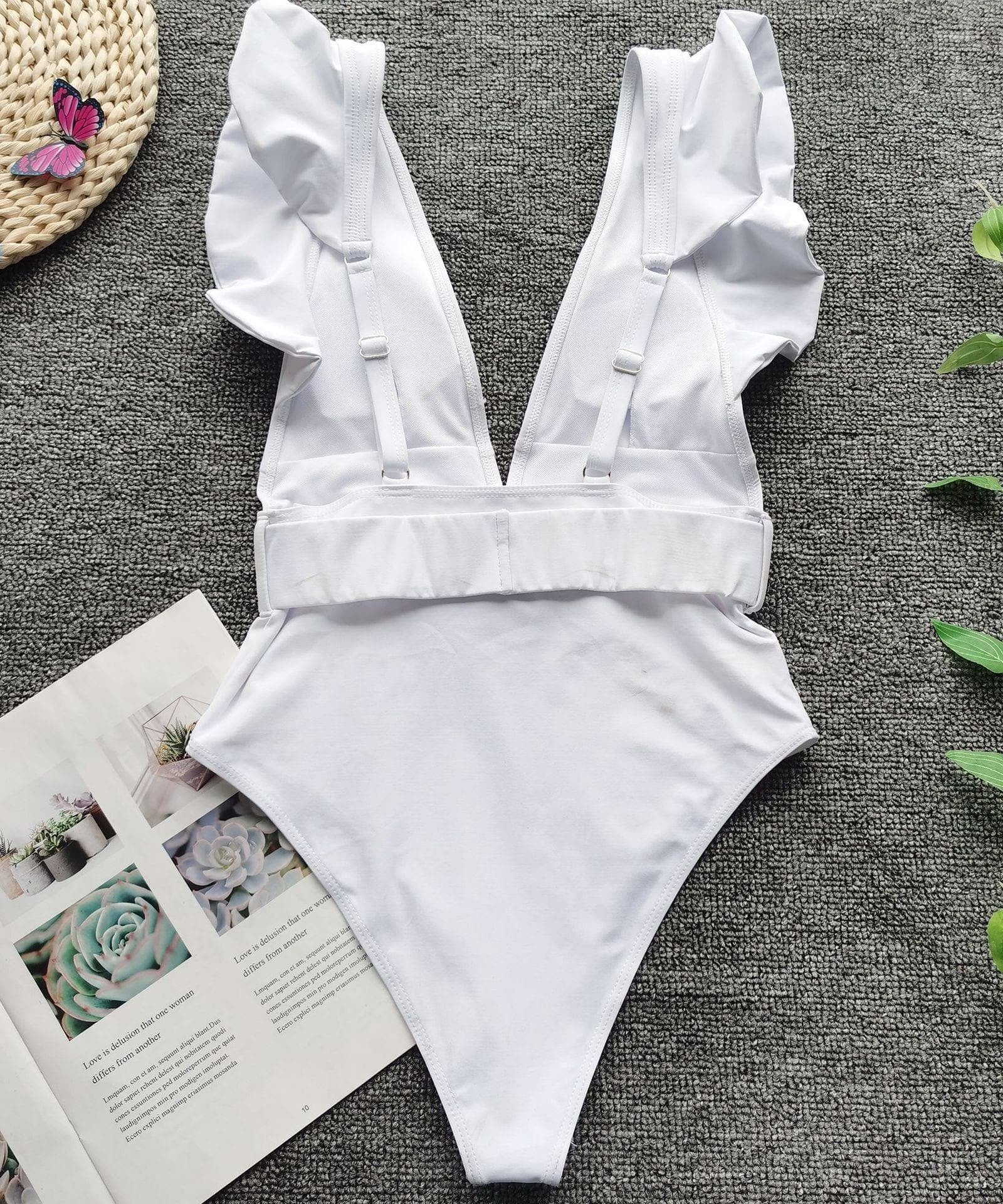 Chic White Ruffle V-Neck One-Piece Swimsuit with Tortoiseshell Buckle | Your Resort & Winter Vacation Essential