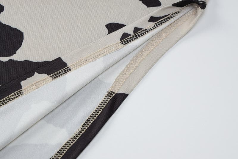 Fall Trend Alert: Cow Print Mock Neck Long Sleeve Bodycon Midi Dress with Asymmetrical Hem