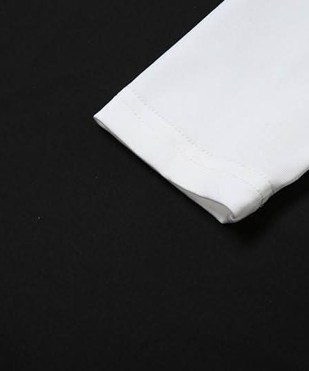 Autumn Glam: Chic White Long Sleeve Ruched Mini Dress - Knot Front & Ruffle Details