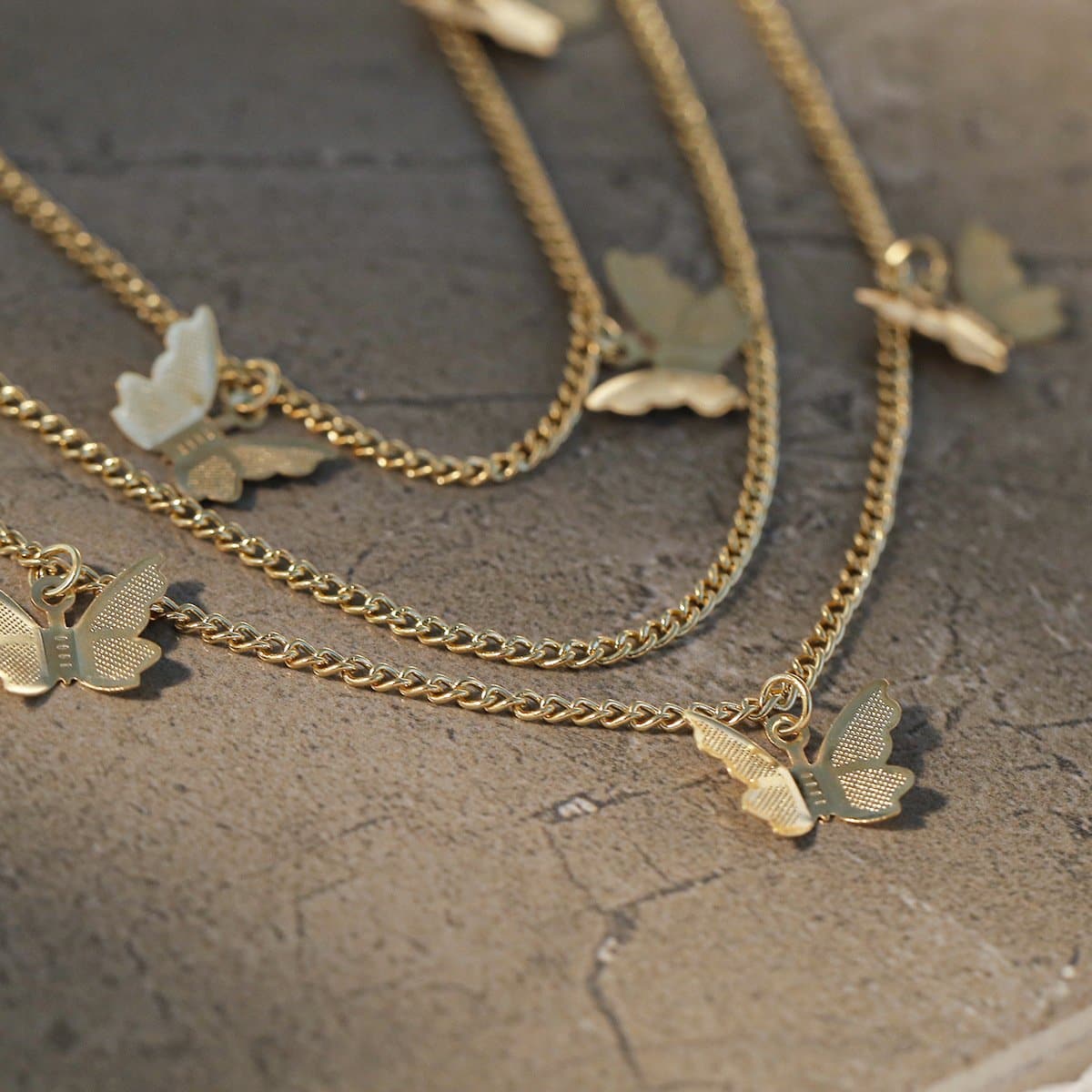 Y2K Enchantment: Layered Butterfly Charm Pants Chain for Edgy Fall Style