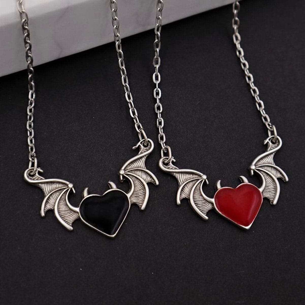 Spooky Chic Bat Wing Heart Necklace - Edgy Goth Pendant for Halloween & Beyond | Black & Red Options