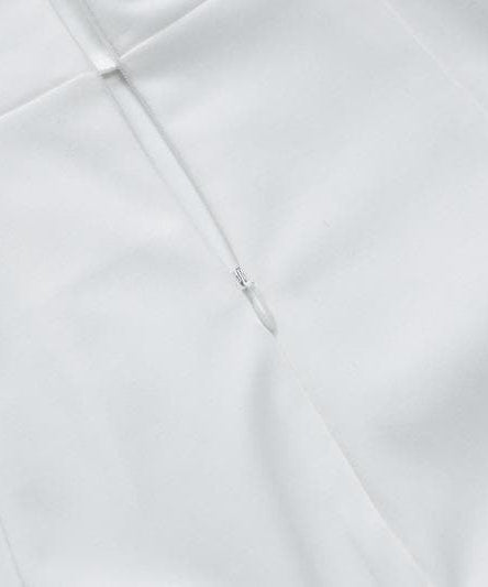 The Essential Little White Halter Mini Dress | Chic & Versatile for Fall Events & Resort Getaways