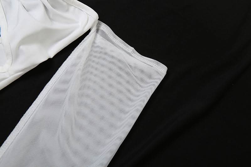 The Ultimate Statement: White O-Ring Cut-Out Maxi Dress with Elegant Long Sleeves – Holiday Galas & NYE Ready